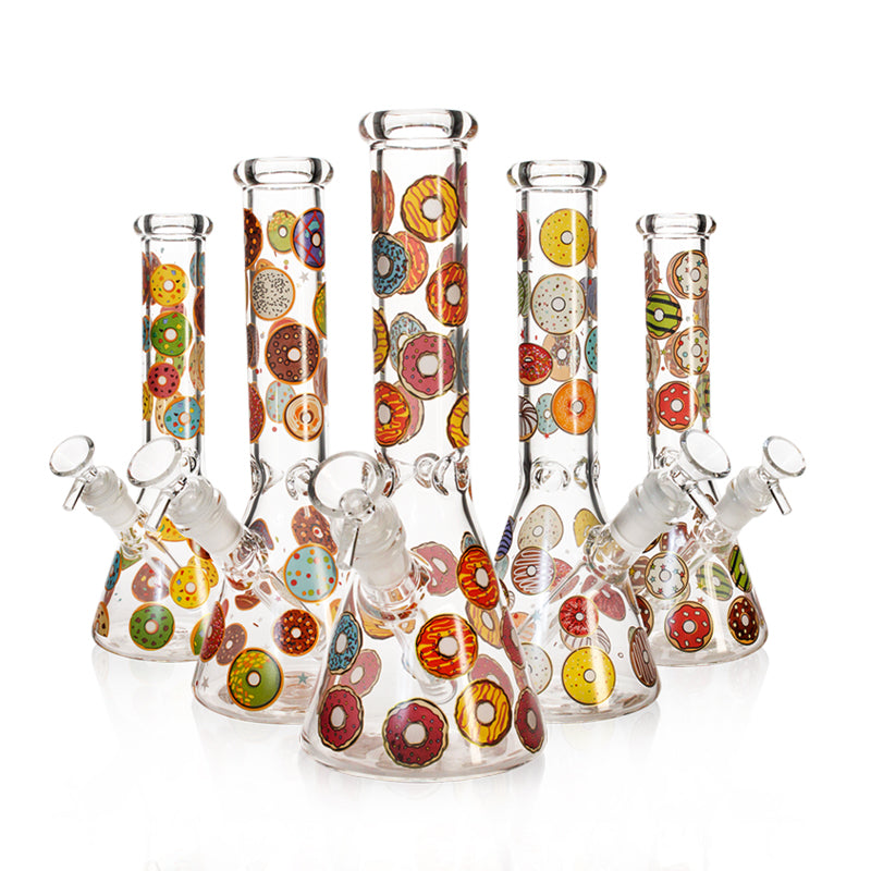 Collection of Phoenix Star 10-inch beaker bongs with assorted donut print patterns in clear glass