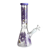 Left-angle shot of the purple Honeybee Decals 10-inch glass beaker pipe, with bees over a hexagon pattern. 