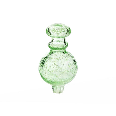 Fat Ass Glass green glow in the dark round carb cap shown upright with translucent green glass and round bubble body