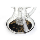 Base closeup of Phoenix Star 9 inch recycler oil rig showing showerhead perc and black disc with gold stars and leaf design