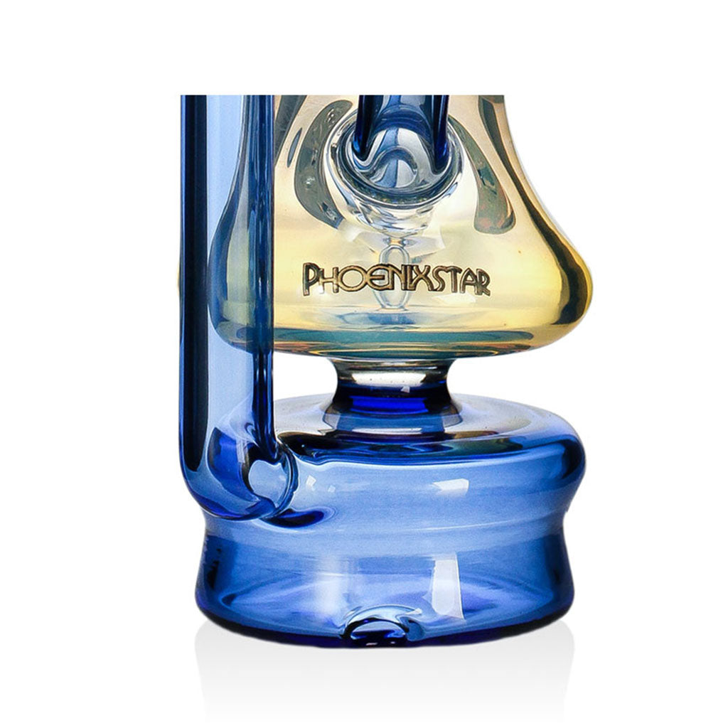 Base and logo detail of the blue Phoenix Star silver fumed Puffco Peak Pro recycler, a premium glass top for sale at Fat Ass Glass.