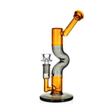 Side view of Phoenix Star Zig Zag inline perc bong in gray and amber showing angled mouthpiece and clear bowl, ready to buy online from Fat Ass Glass. 
