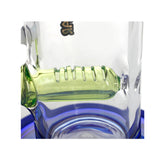 Close-up of inline diffuser green perc on PHX Tube Sidecar Inline Diffuser Perc Glass Bong on blue base