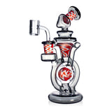 Black Wig Wag Orb recycler glass rig with 14mm 90 degree quartz banger and wig wag accents on clear glass body